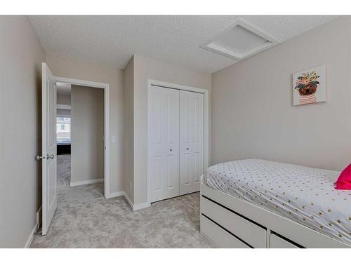 128 Copperpond Parade Se, Calgary, AB - Indoor Photo Showing Bedroom