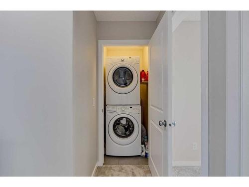 128 Copperpond Parade Se, Calgary, AB - Indoor Photo Showing Laundry Room