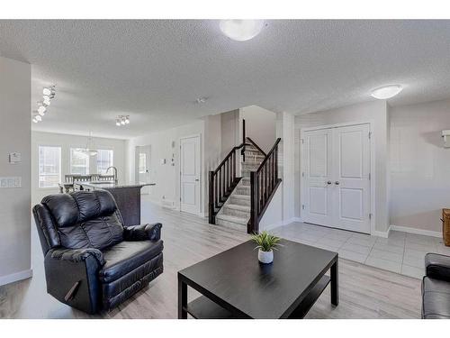 128 Copperpond Parade Se, Calgary, AB - Indoor Photo Showing Living Room