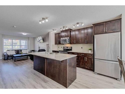 128 Copperpond Parade Se, Calgary, AB - Indoor Photo Showing Kitchen With Stainless Steel Kitchen