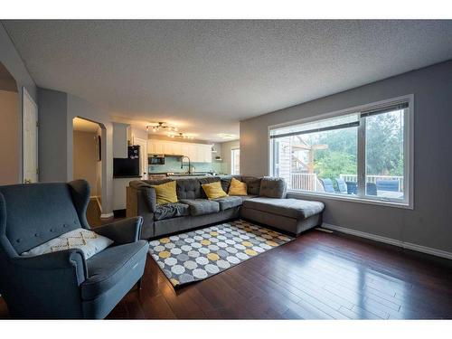 76 Chaparral Road Se, Calgary, AB - Indoor Photo Showing Living Room