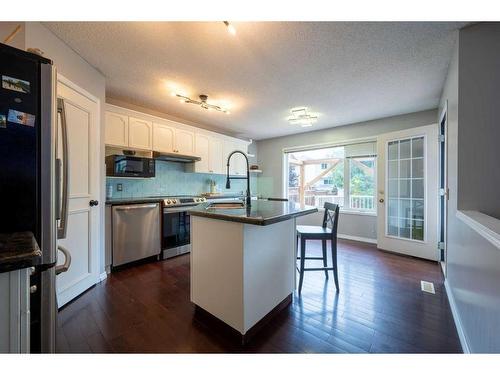 76 Chaparral Road Se, Calgary, AB - Indoor Photo Showing Kitchen With Upgraded Kitchen