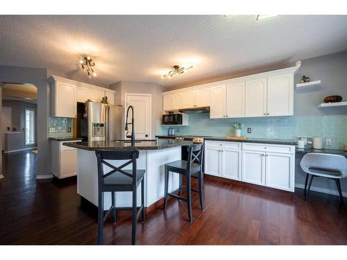 76 Chaparral Road Se, Calgary, AB - Indoor Photo Showing Kitchen With Upgraded Kitchen