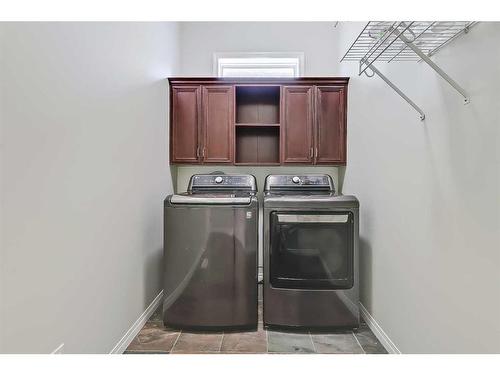 133 Tusslewood Heights Nw, Calgary, AB - Indoor Photo Showing Laundry Room