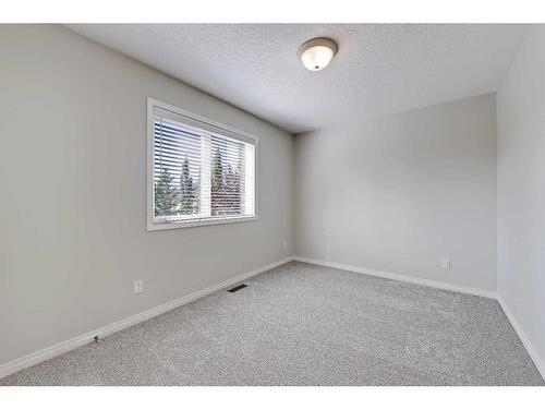 133 Tusslewood Heights Nw, Calgary, AB - Indoor Photo Showing Other Room