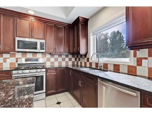 133 Tusslewood Heights Nw, Calgary, AB - Indoor Photo Showing Kitchen With Double Sink