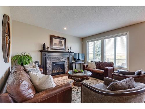 194 Valley Pointe Way Nw, Calgary, AB - Indoor Photo Showing Living Room With Fireplace