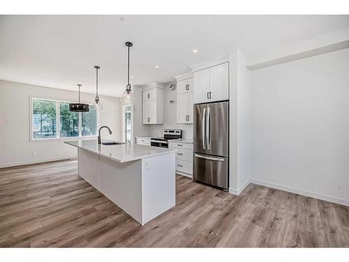 35 White Pelican Way, Rural Vulcan County, AB - Indoor Photo Showing Kitchen With Upgraded Kitchen