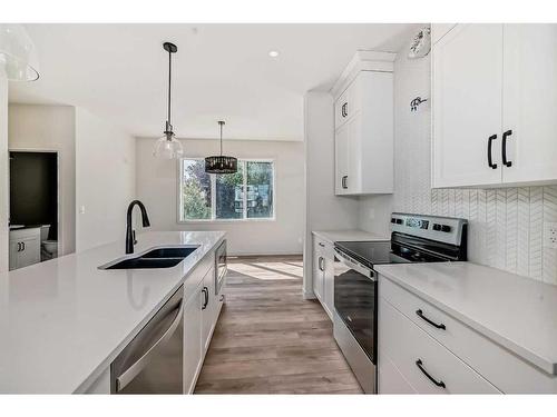 35 White Pelican Way, Rural Vulcan County, AB - Indoor Photo Showing Kitchen With Double Sink With Upgraded Kitchen