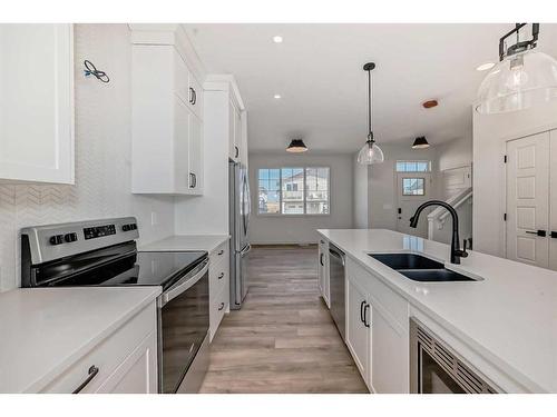 35 White Pelican Way, Rural Vulcan County, AB - Indoor Photo Showing Kitchen With Double Sink With Upgraded Kitchen