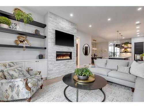 2027 46 Avenue Sw, Calgary, AB - Indoor Photo Showing Living Room With Fireplace