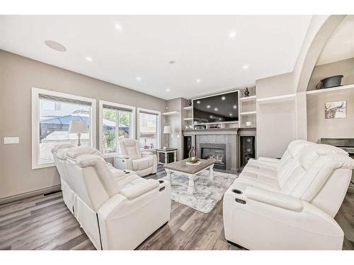 286 Taravista Drive Ne, Calgary, AB - Indoor Photo Showing Living Room With Fireplace