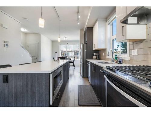 27 Sherwood Lane Nw, Calgary, AB - Indoor Photo Showing Kitchen With Upgraded Kitchen