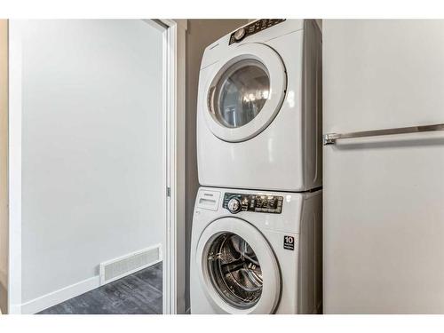 415 Cranford Walk Se, Calgary, AB - Indoor Photo Showing Laundry Room