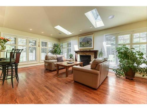 6948 Livingstone Drive Sw, Calgary, AB - Indoor Photo Showing Living Room With Fireplace