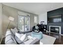 221 Ascot Circle Sw, Calgary, AB  - Indoor Photo Showing Living Room With Fireplace 