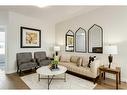 207 South Shore Court, Chestermere, AB  - Indoor Photo Showing Living Room 