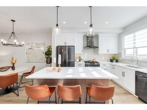 207 South Shore Court, Chestermere, AB - Indoor Photo Showing Kitchen With Double Sink With Upgraded Kitchen