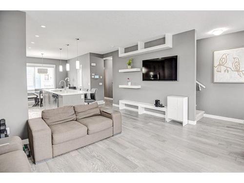 60-111 Rainbow Falls Gate, Chestermere, AB - Indoor Photo Showing Living Room