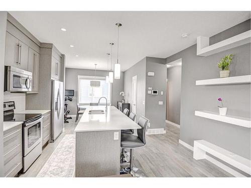 60-111 Rainbow Falls Gate, Chestermere, AB - Indoor Photo Showing Kitchen With Stainless Steel Kitchen With Upgraded Kitchen