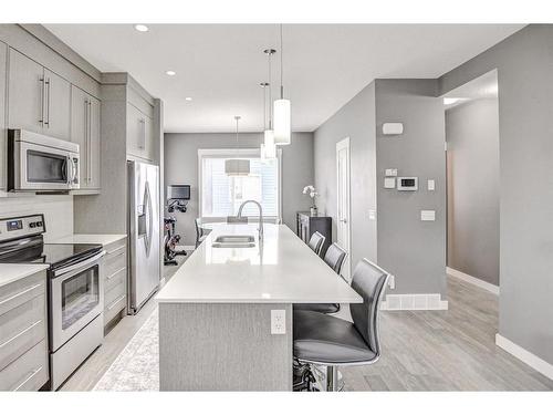 60-111 Rainbow Falls Gate, Chestermere, AB - Indoor Photo Showing Kitchen With Stainless Steel Kitchen With Upgraded Kitchen