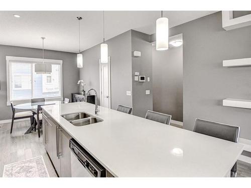 60-111 Rainbow Falls Gate, Chestermere, AB - Indoor Photo Showing Kitchen With Double Sink With Upgraded Kitchen