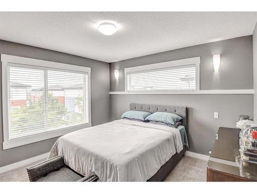 60-111 Rainbow Falls Gate, Chestermere, AB - Indoor Photo Showing Bedroom