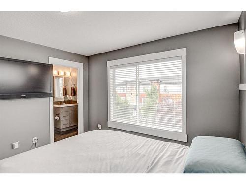 60-111 Rainbow Falls Gate, Chestermere, AB - Indoor Photo Showing Bedroom