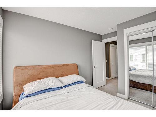 60-111 Rainbow Falls Gate, Chestermere, AB - Indoor Photo Showing Bedroom