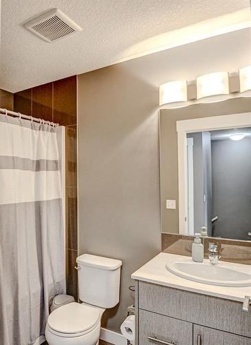 60-111 Rainbow Falls Gate, Chestermere, AB - Indoor Photo Showing Bathroom