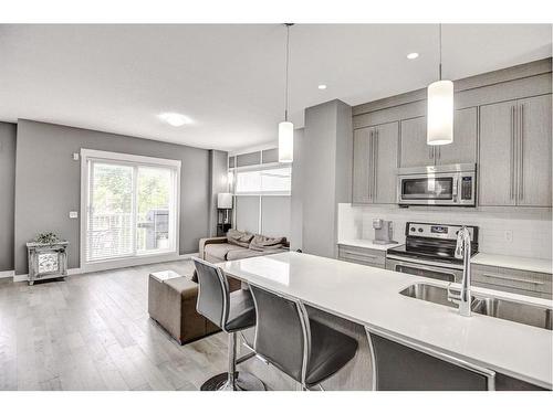 60-111 Rainbow Falls Gate, Chestermere, AB - Indoor Photo Showing Kitchen With Stainless Steel Kitchen With Upgraded Kitchen