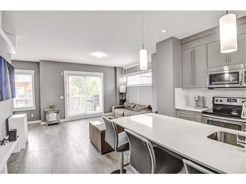 60-111 Rainbow Falls Gate, Chestermere, AB - Indoor Photo Showing Kitchen With Upgraded Kitchen