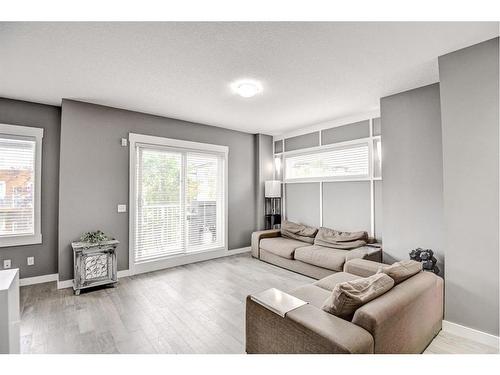 60-111 Rainbow Falls Gate, Chestermere, AB - Indoor Photo Showing Living Room