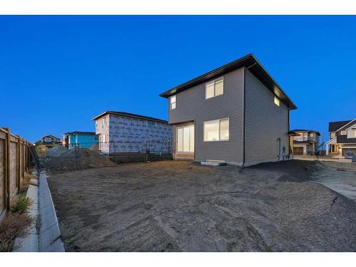 907 Langholm Drive Se, Airdrie, AB - Outdoor With Exterior