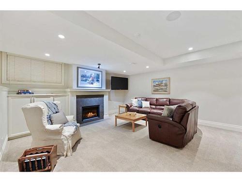 49 Mayfair Road Sw, Calgary, AB - Indoor With Fireplace