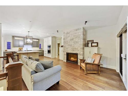 49 Mayfair Road Sw, Calgary, AB - Indoor Photo Showing Living Room With Fireplace