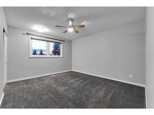 251 Rundlecairn Road Ne, Calgary, AB - Indoor Photo Showing Other Room