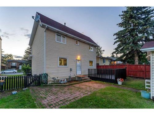 251 Rundlecairn Road Ne, Calgary, AB - Outdoor With Deck Patio Veranda With Exterior