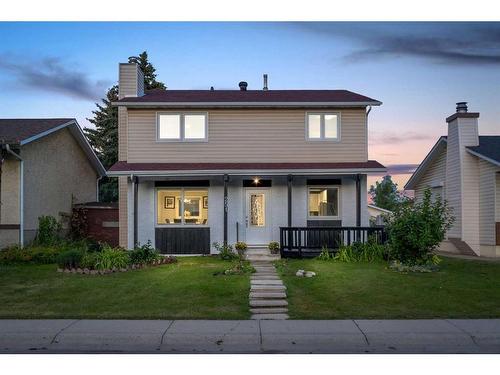 251 Rundlecairn Road Ne, Calgary, AB - Outdoor With Deck Patio Veranda With Facade