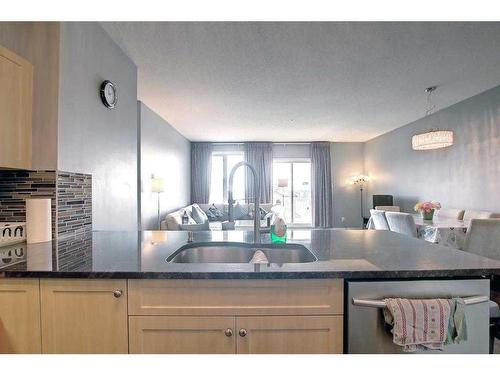 2308-1140 Taradale Drive Ne, Calgary, AB - Indoor Photo Showing Kitchen With Double Sink