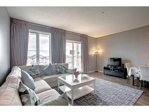 2308-1140 Taradale Drive Ne, Calgary, AB - Indoor Photo Showing Living Room