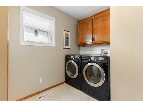 204 Douglas Shore Close Se, Calgary, AB - Indoor Photo Showing Laundry Room