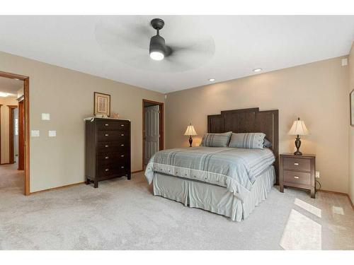 204 Douglas Shore Close Se, Calgary, AB - Indoor Photo Showing Bedroom