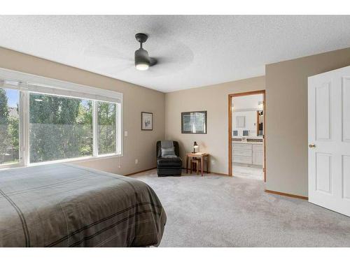 204 Douglas Shore Close Se, Calgary, AB - Indoor Photo Showing Bedroom