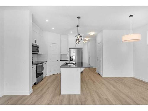 304 Hotchkiss Drive Se, Calgary, AB - Indoor Photo Showing Kitchen With Upgraded Kitchen