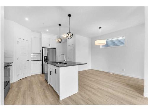 304 Hotchkiss Drive Se, Calgary, AB - Indoor Photo Showing Kitchen With Upgraded Kitchen