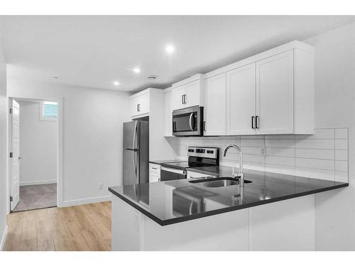 304 Hotchkiss Drive Se, Calgary, AB - Indoor Photo Showing Kitchen With Upgraded Kitchen