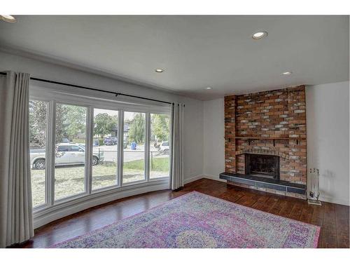 119 Deer Park Place Se, Calgary, AB - Indoor Photo Showing Living Room With Fireplace