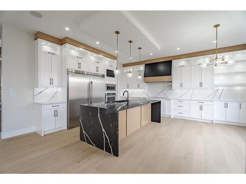 321 Watercrest Place, Chestermere, AB - Indoor Photo Showing Kitchen With Upgraded Kitchen