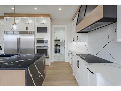 321 Watercrest Place, Chestermere, AB - Indoor Photo Showing Kitchen With Upgraded Kitchen